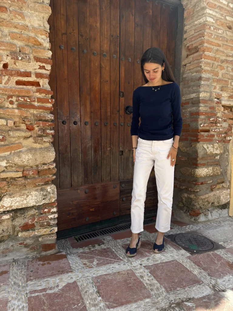 Victoria models the Anna Marine espadrille, a stylish summer shoe from the new collection, crafted with marine blue fabric, lightweight, and perfect for casual or semi-formal occasions.